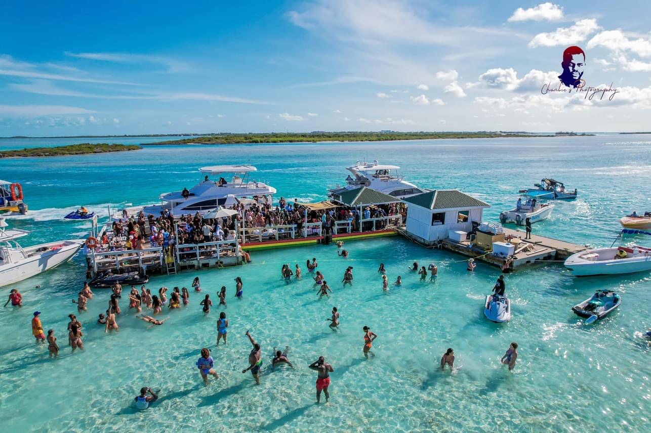 Noah’s Ark Floating Tiki Bar at Turks & Caicos — turquoise water, beach club vibes, Sunday party scene