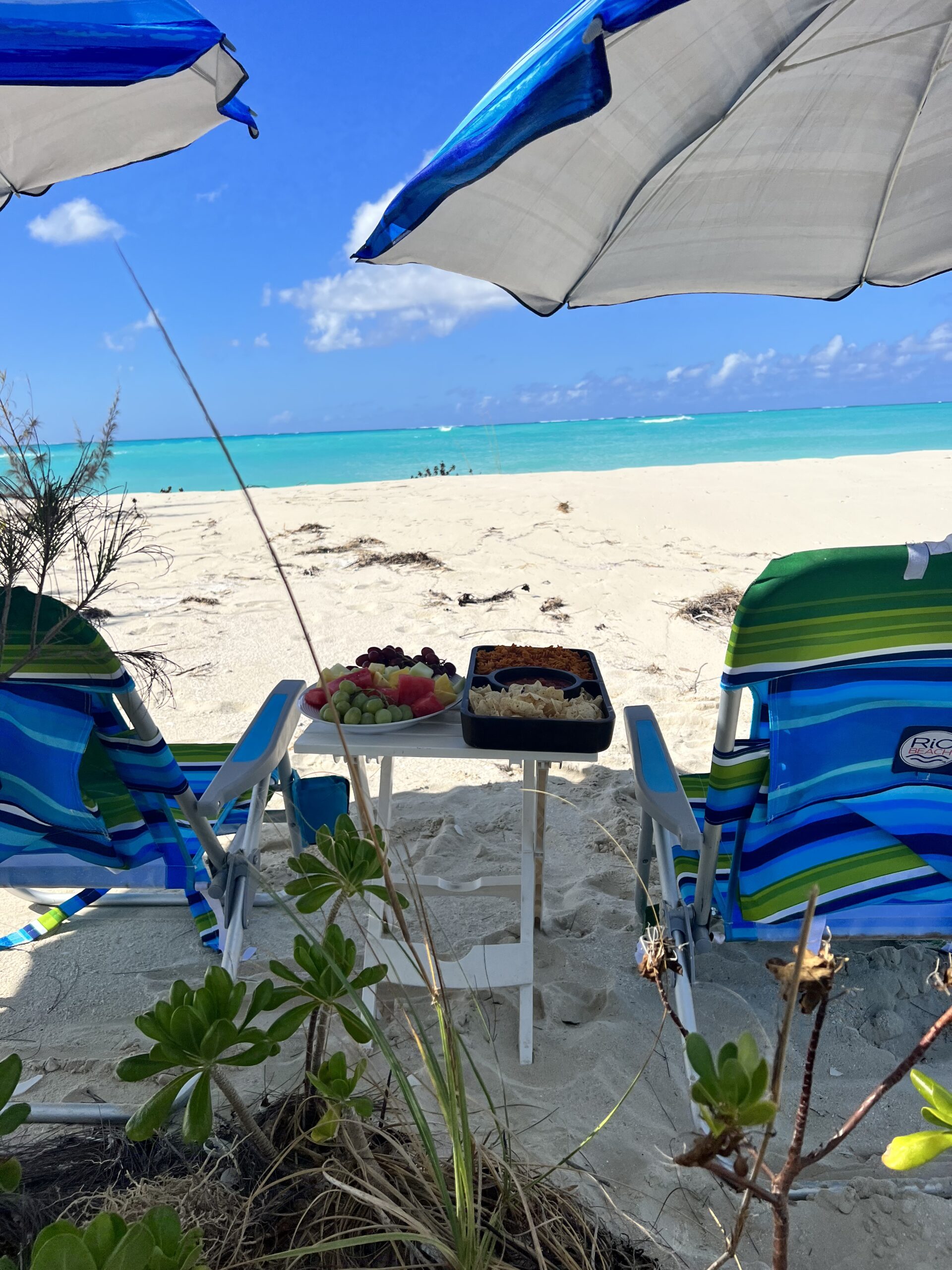 Turks and Caicos water taxi ferry beside a white-sand island
