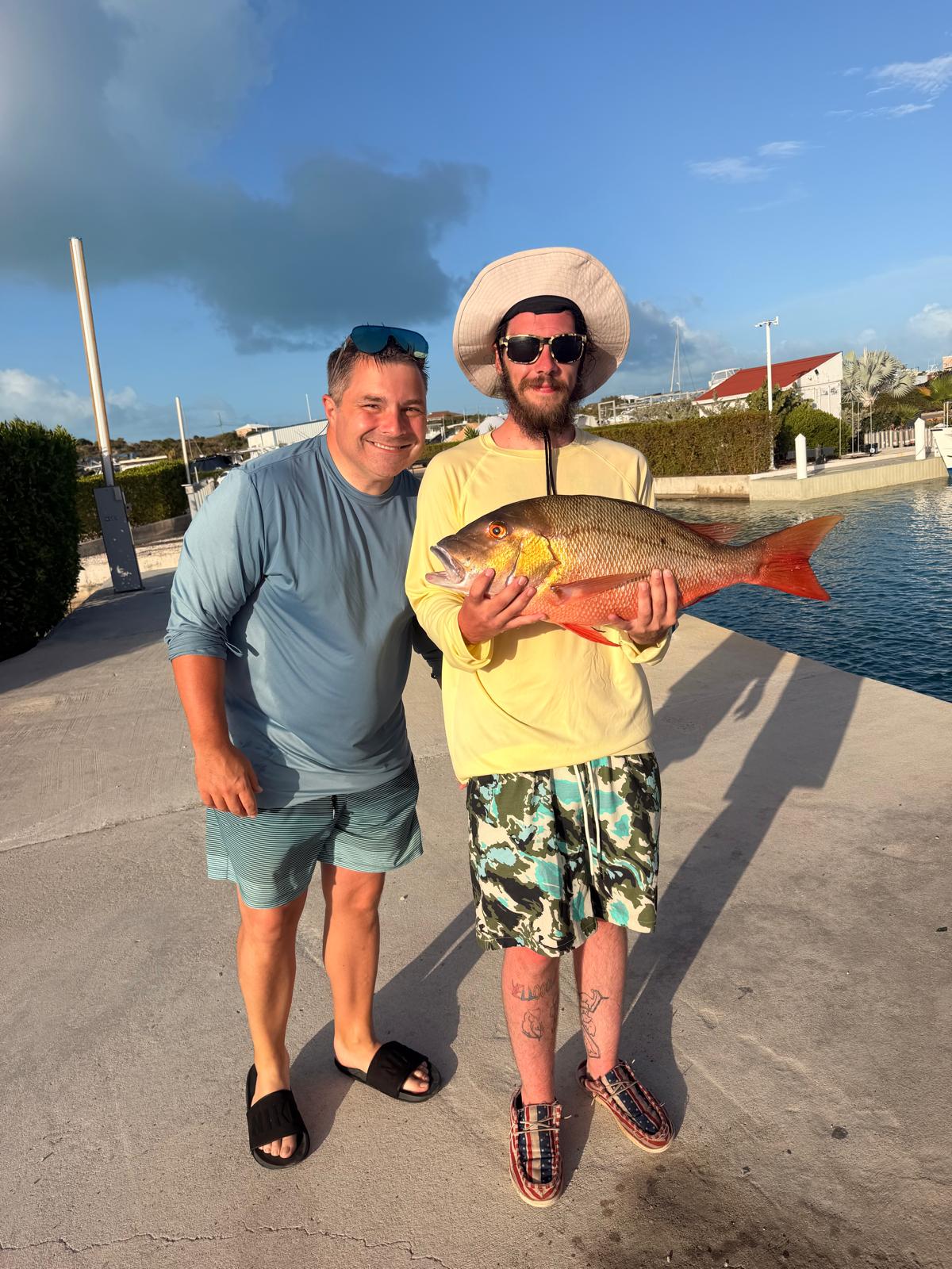Guest bottom fishing for snapper and grouper in Turks and Caicos